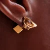 Brincos de botão Éole, edição banhada a ouro de 24 quilates