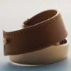 Pulseira Ormé, edição dourada com couro camel